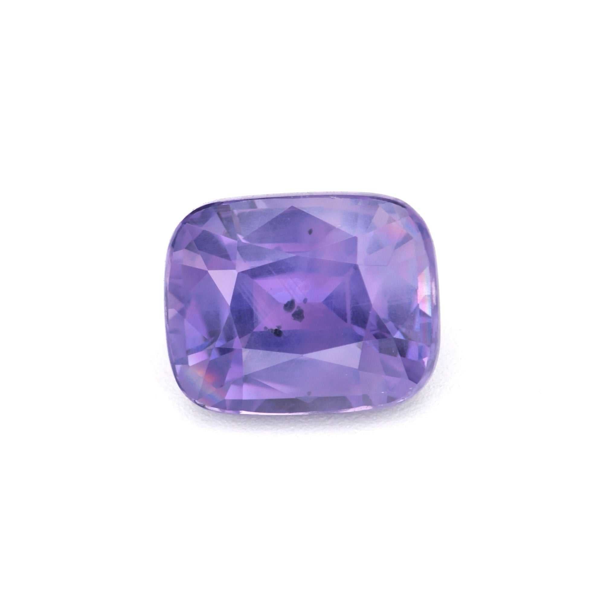 Discover the allure, investment potential, and variety of purple sapphires, the royal gemstone of rare elegance. Explore Crescent Gems' expert guide today. gemstone showcasing its royal hue and brilliant facets