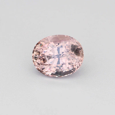 1.12 ct natural unheated peach sapphire gemstone with oval cut and brilliant clarity