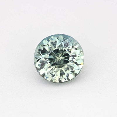 1.70 carat natural unheated green sapphire gemstone with brilliant cut and vivid green hue
