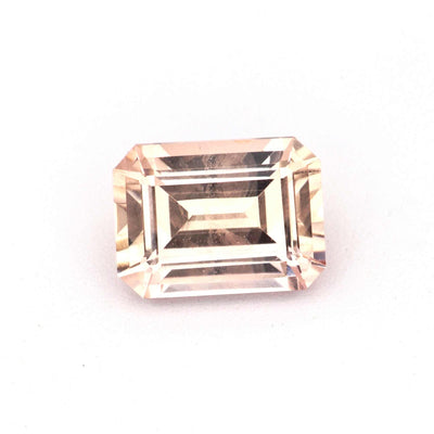 0.61 Ct natural unheated peach sapphire gemstone with brilliant cut and soft peach hue