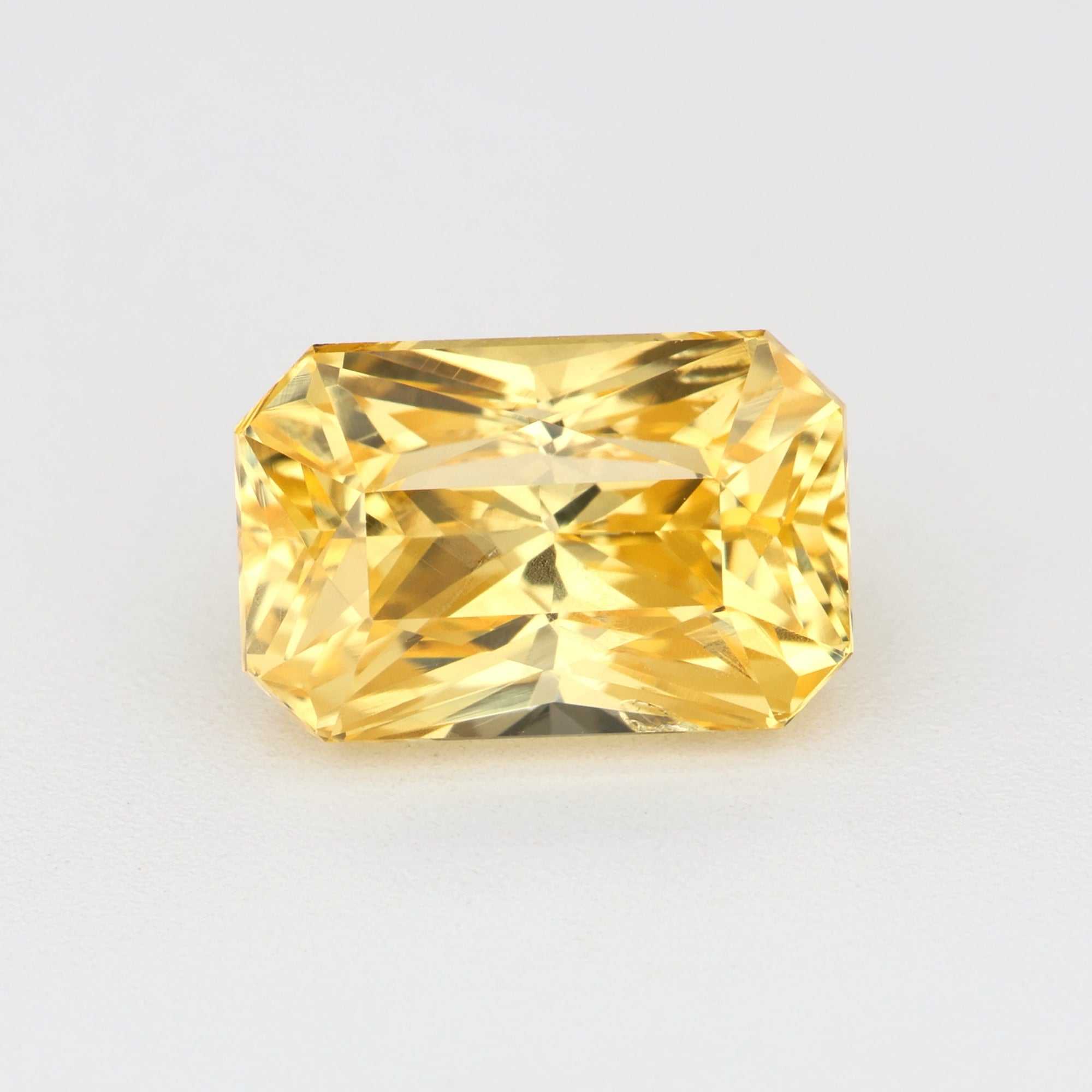 1.82 ct natural untreated vivid yellow sapphire gemstone with excellent clarity and golden hue