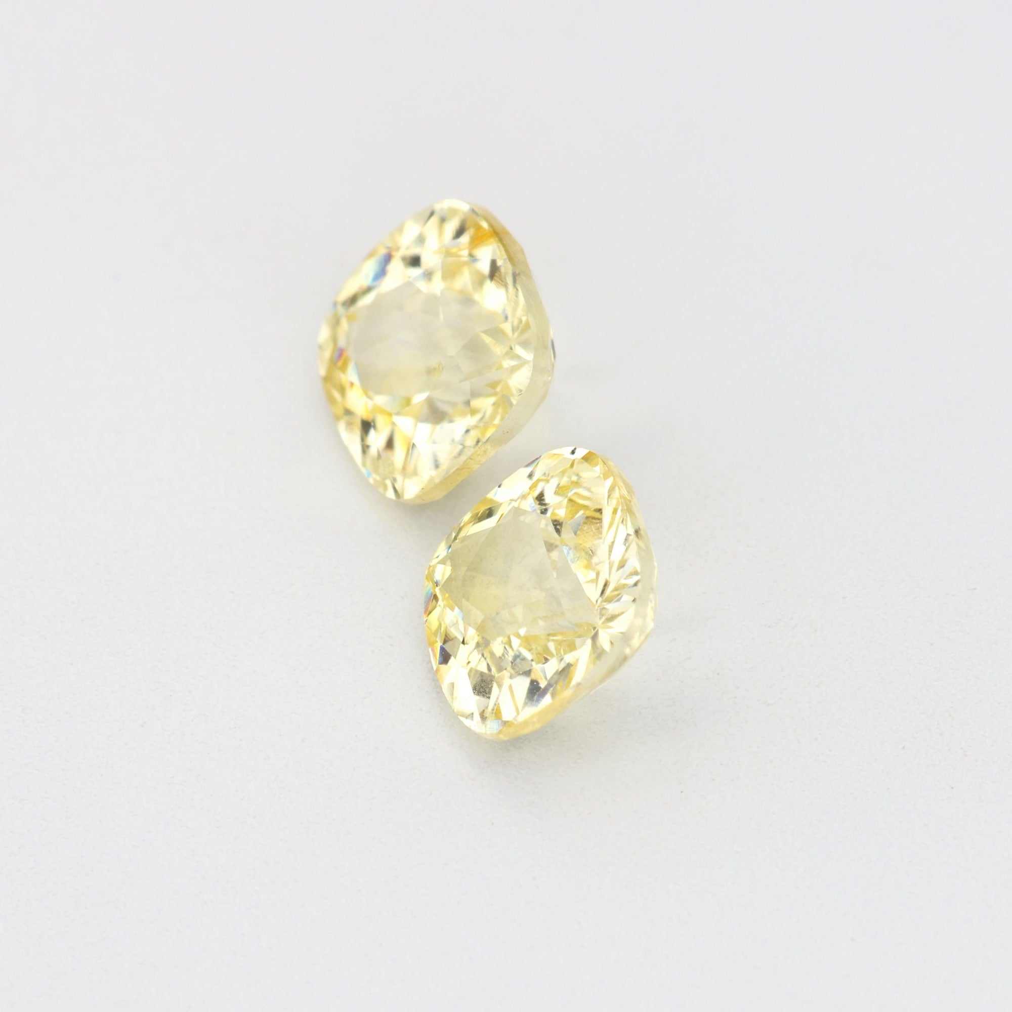 Pair of 1.11 ct unheated yellow sapphires with natural golden hue and excellent clarity