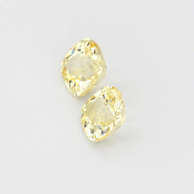 1.11 ct unheated yellow sapphire pair with natural golden hue and excellent clarity
