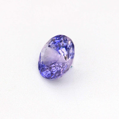 0.44 carat unheated violet sapphire gemstone with rich purple color and excellent clarity