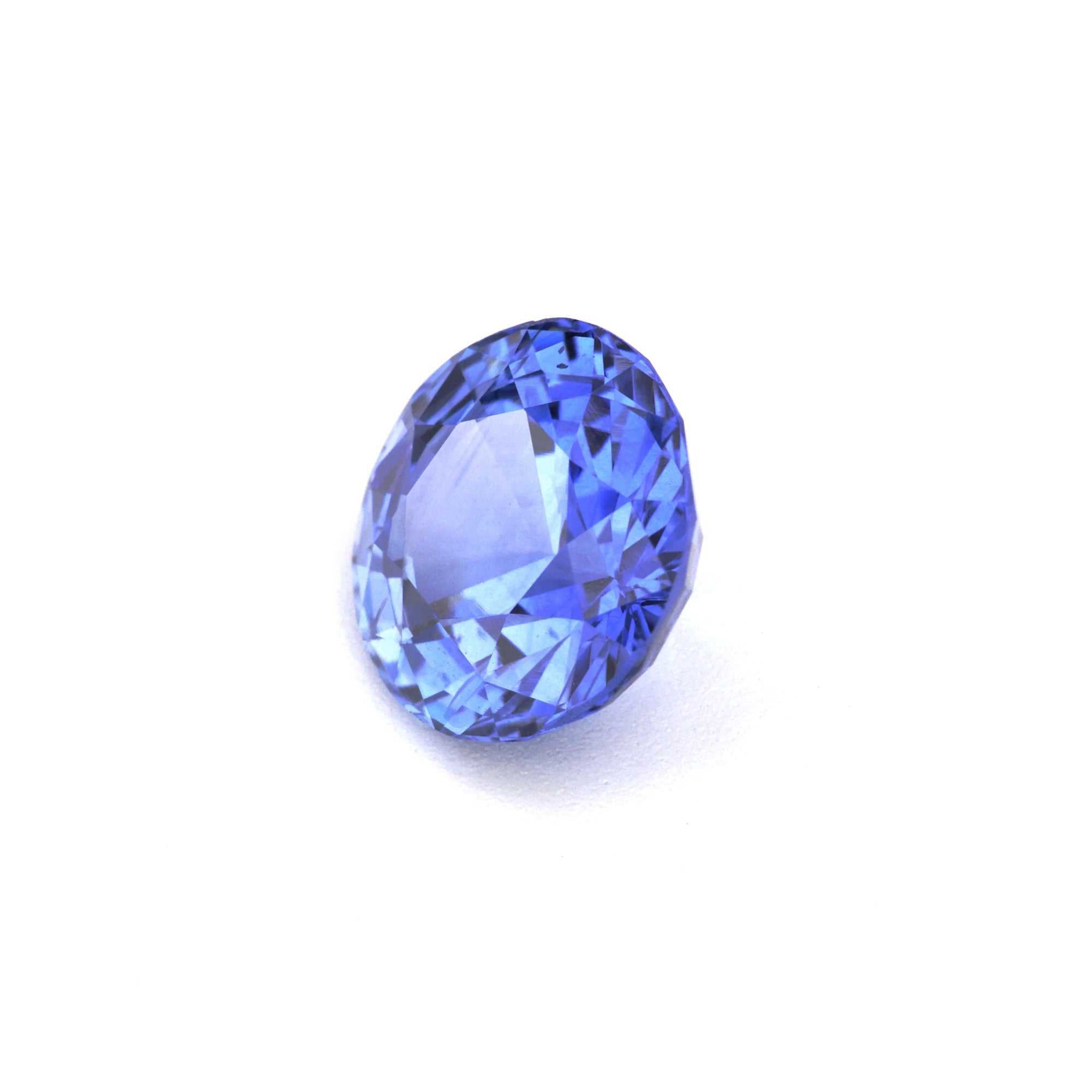 Brilliant 1.62 Ct round-cut blue sapphire gemstone with deep Ceylon blue hue and excellent clarity