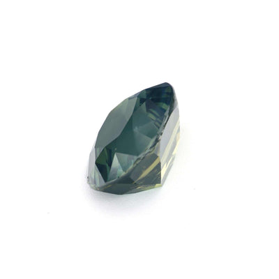 3.26 ct olive green sapphire gemstone with brilliant cut and excellent clarity