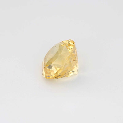 3.13 ct unheated yellow sapphire round brilliant cut gemstone with natural golden hue and excellent clarity