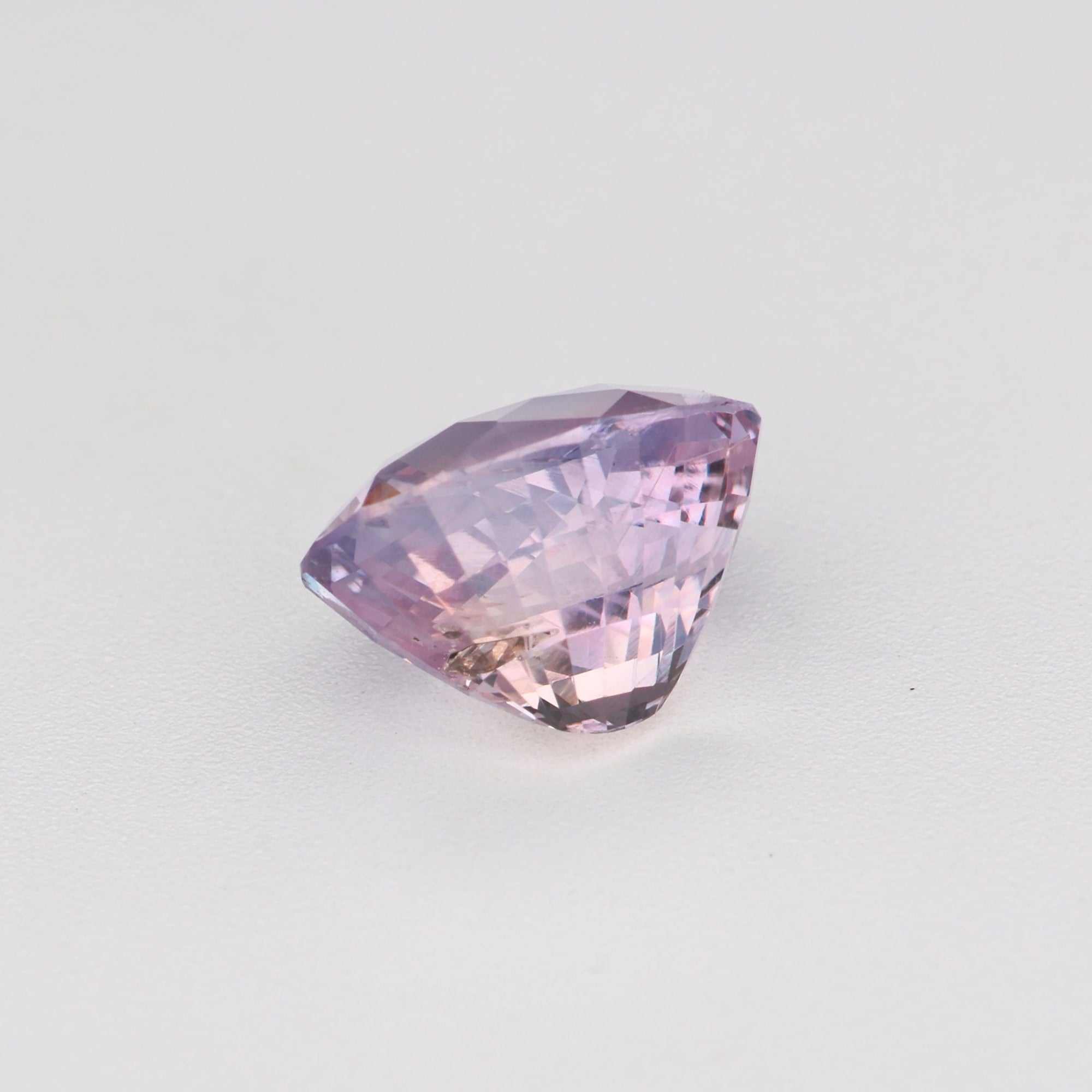 1.12 ct natural unheated peach sapphire gemstone with excellent clarity and warm peach hue