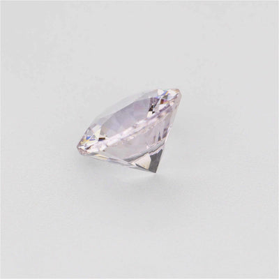 1.30 ct Round White Sapphire Gemstone on white background showing transparency