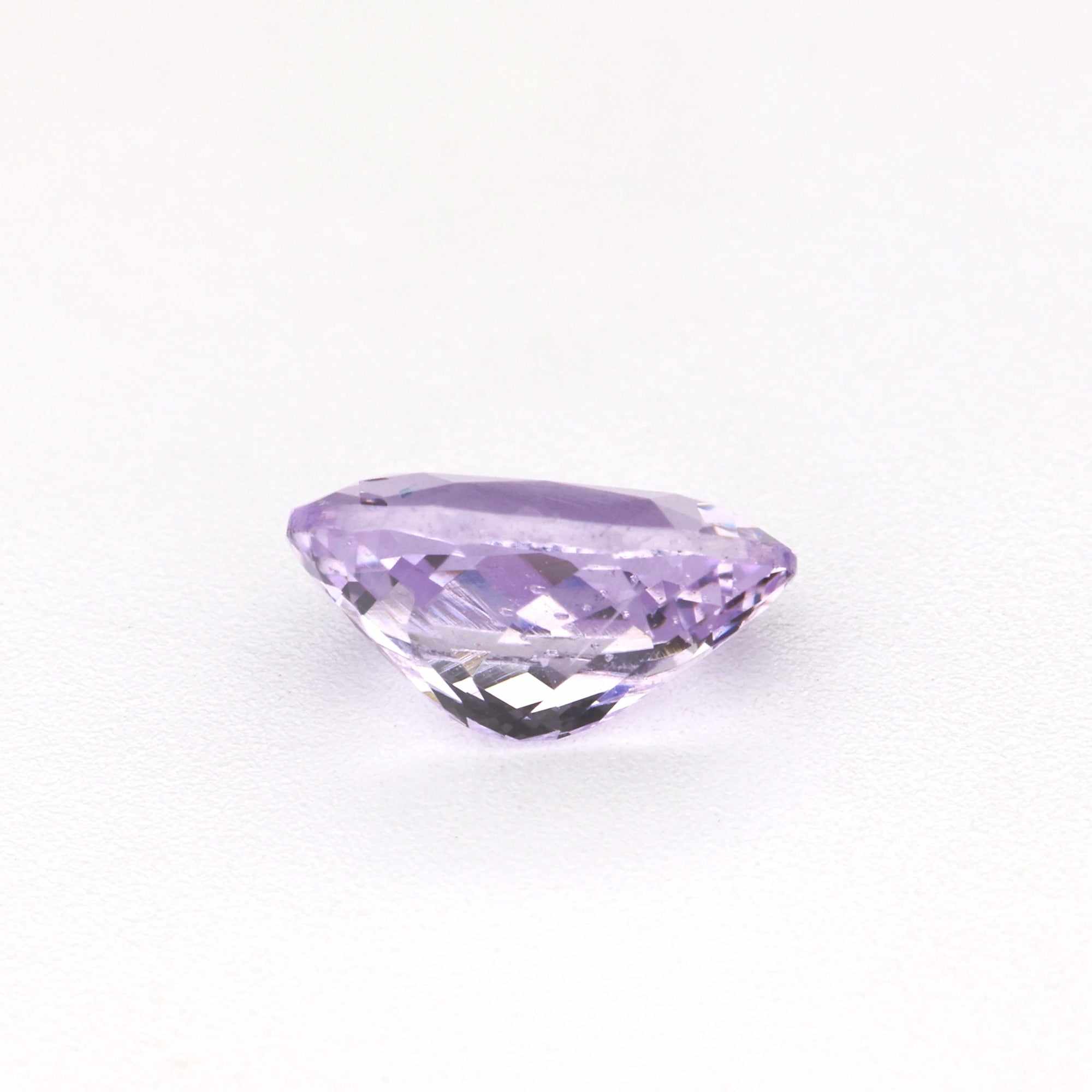 0.60 carat unheated natural lavender sapphire gemstone with rich purple hue and excellent clarity