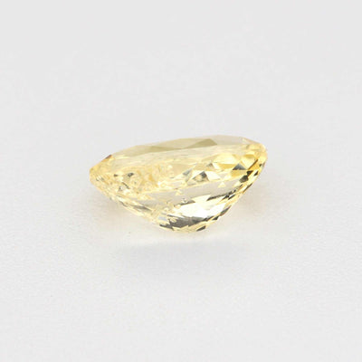 0.62ct unheated yellow sapphire gemstone with natural golden hue and high clarity