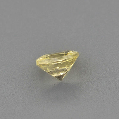0.36 ct untreated yellow sapphire gemstone with natural golden hue and excellent clarity