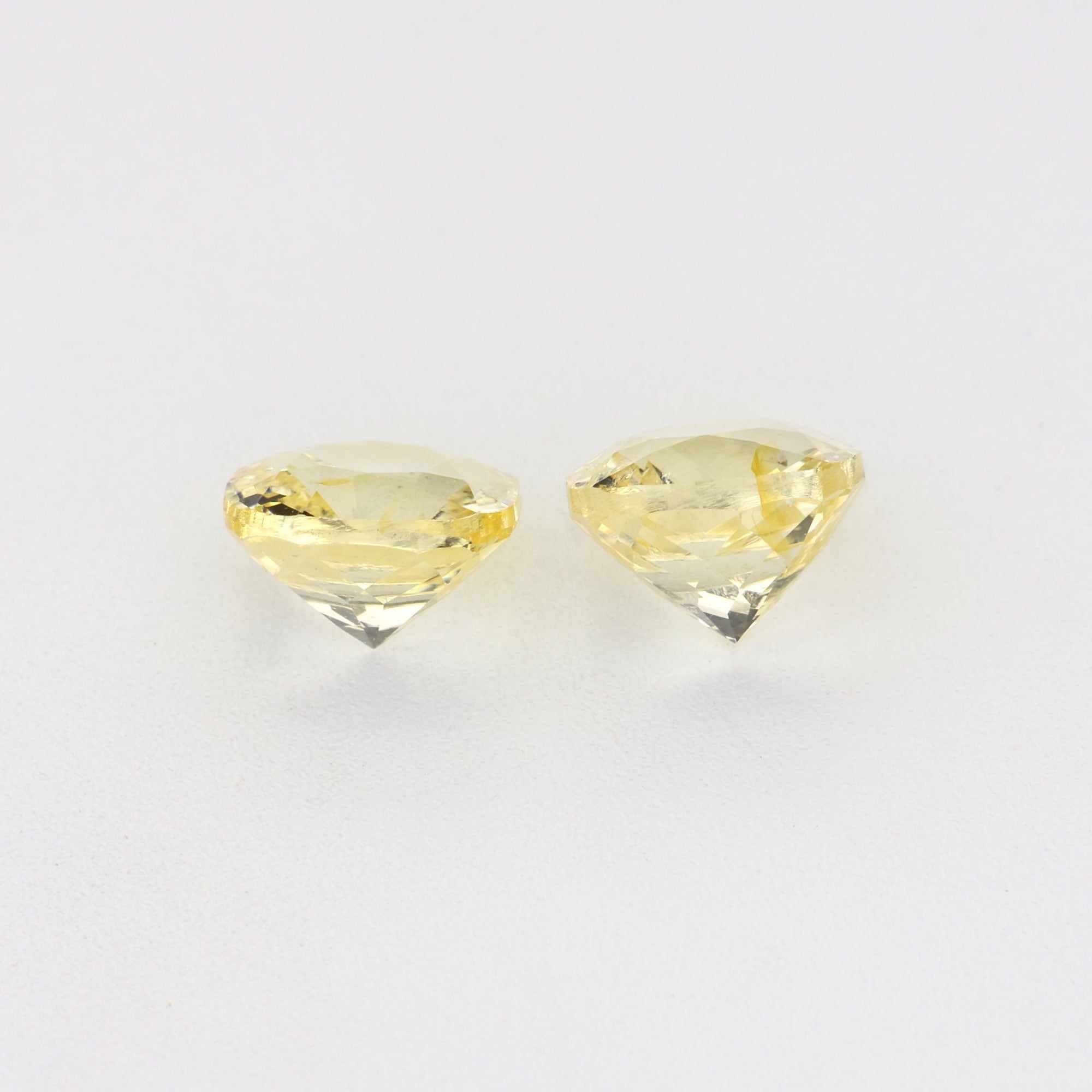 Pair of 1.11 ct unheated yellow sapphires with natural golden hue and excellent clarity