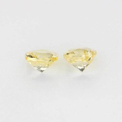 Pair of 1.11 ct unheated yellow sapphires with natural golden hue and excellent clarity