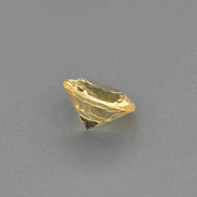 0.43 ct natural unheated yellow sapphire gemstone with radiant golden hue and excellent clarity