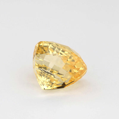 2.10 ct untreated yellow sapphire gemstone with natural golden hue and excellent clarity