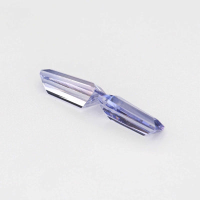 0.78 ctw tapered baguette purple sapphire pair showing matched cut and transparency
