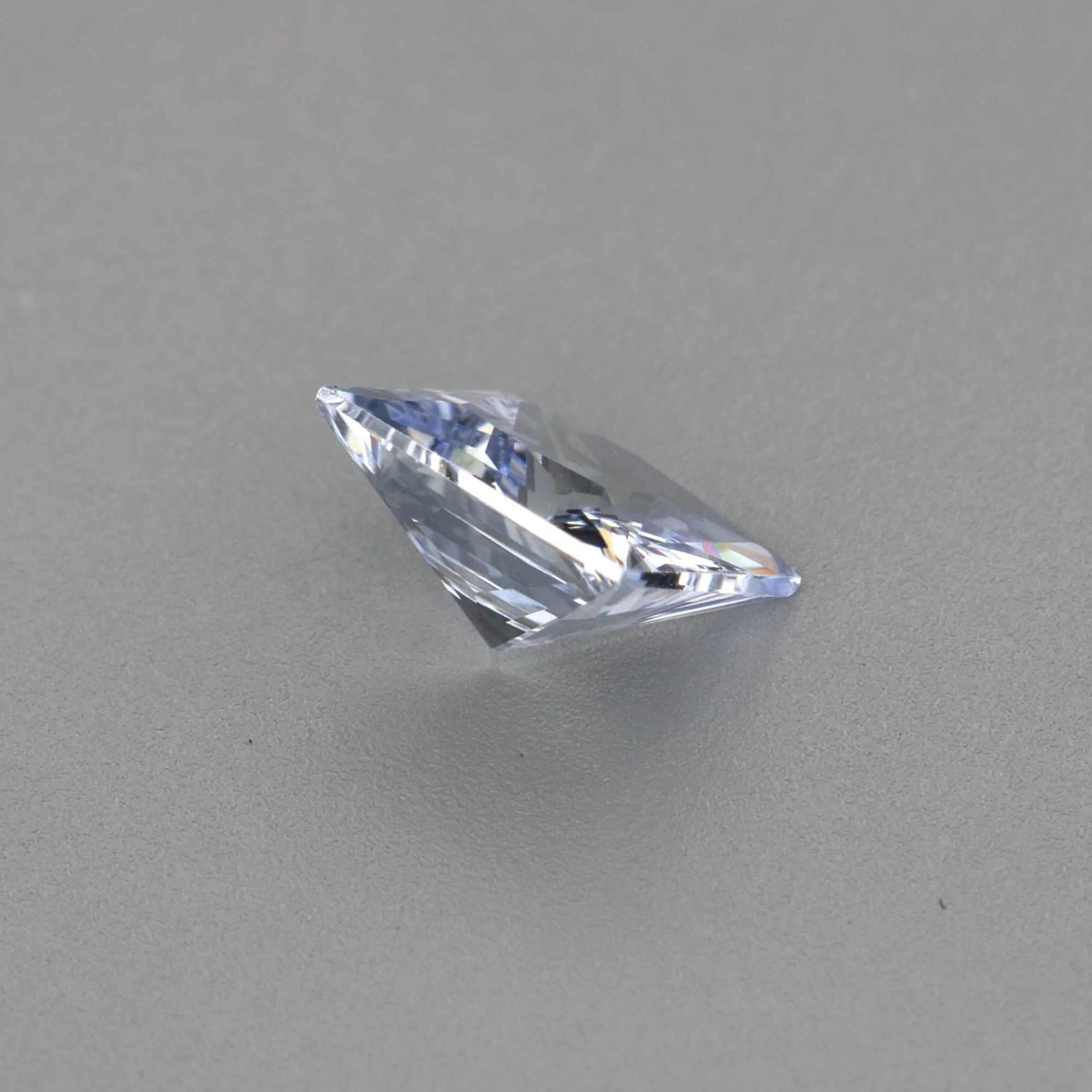 0.61 ct Princess cut White Sapphire with brilliant clarity and sparkle, ideal diamond substitute for custom jewelry designs