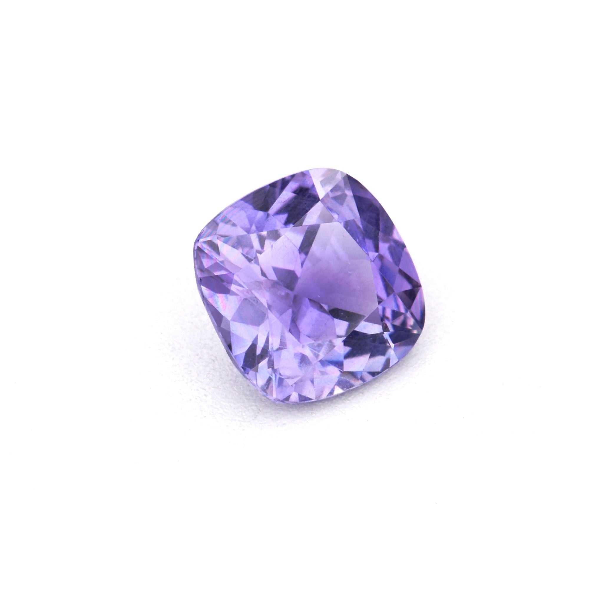 0.46 ct Violet Cushion Sapphire with vivid purple-blue hue and excellent clarity
