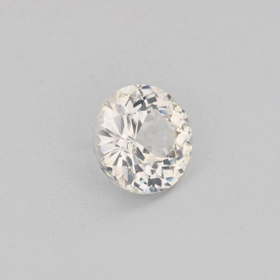 0.68ct 5mm round white sapphire gemstone with brilliant sparkle and precision cut