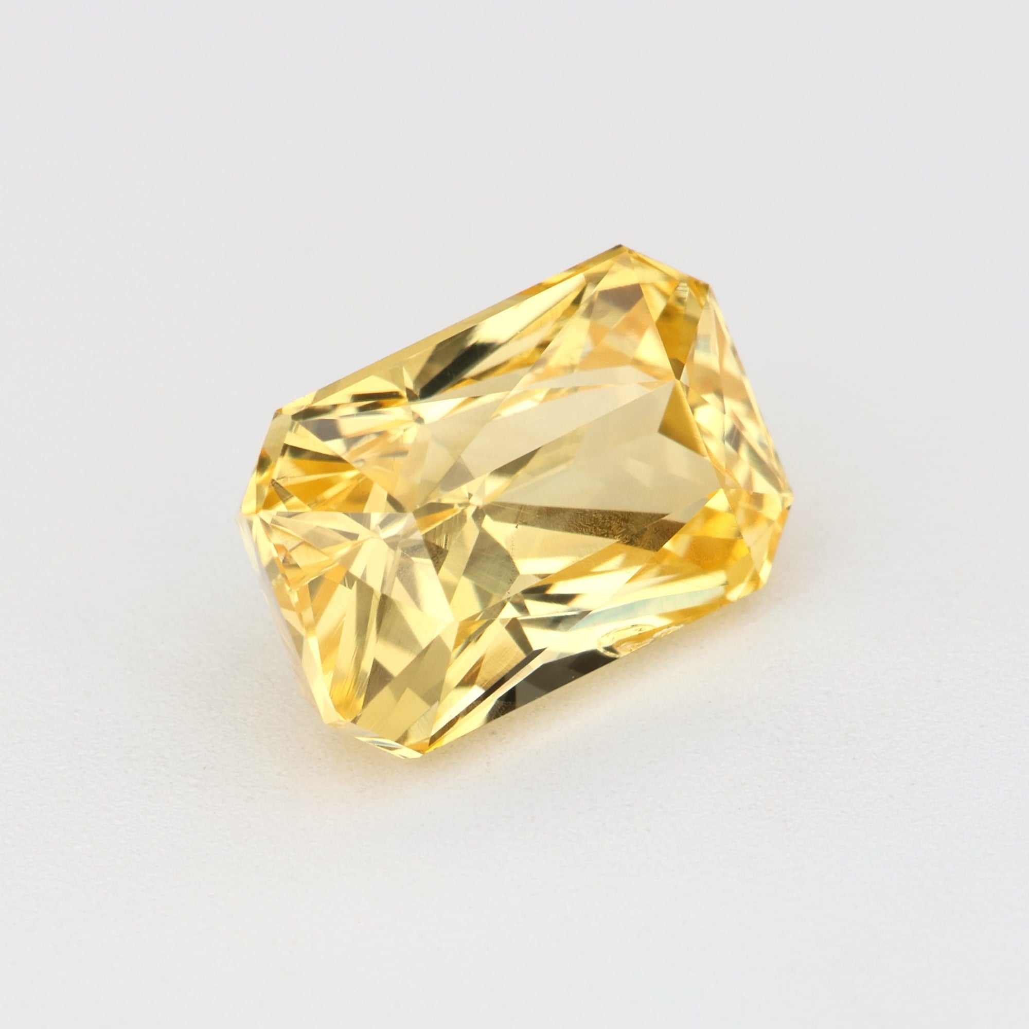 1.82 ct natural untreated vivid yellow sapphire gemstone with excellent clarity and golden hue