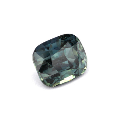 Close-up of a 2.01 ct unheated teal sapphire with brilliant clarity and blue-green color change