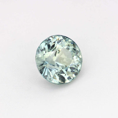 Close-up of 1.70 ct unheated green sapphire gemstone with brilliant natural green hue and excellent clarity