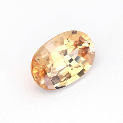 1.18ct natural unheated peach sapphire gemstone with excellent clarity and warm soft peach hue