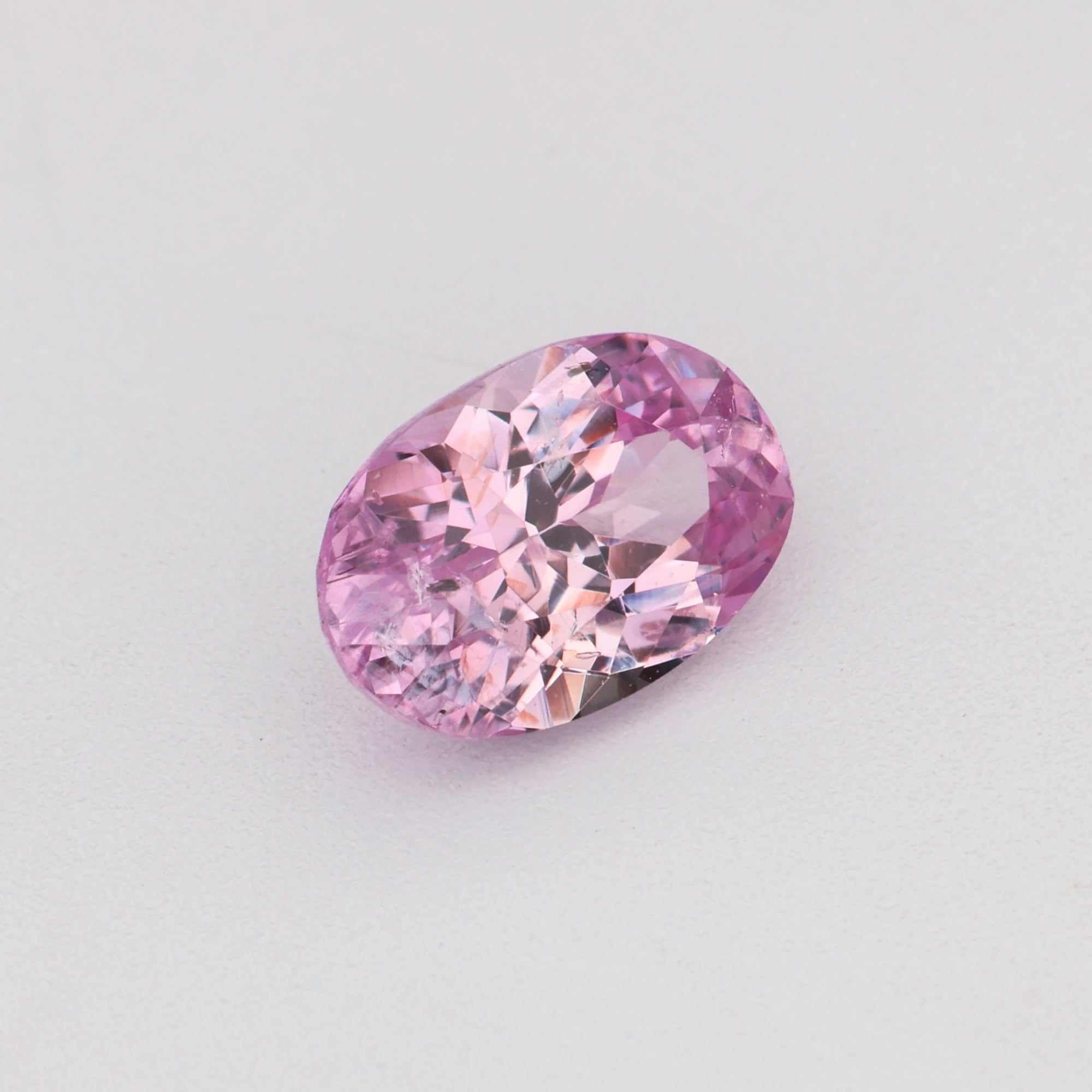 0.57 ct natural untreated pink sapphire gemstone with soft pink hue and excellent clarity
