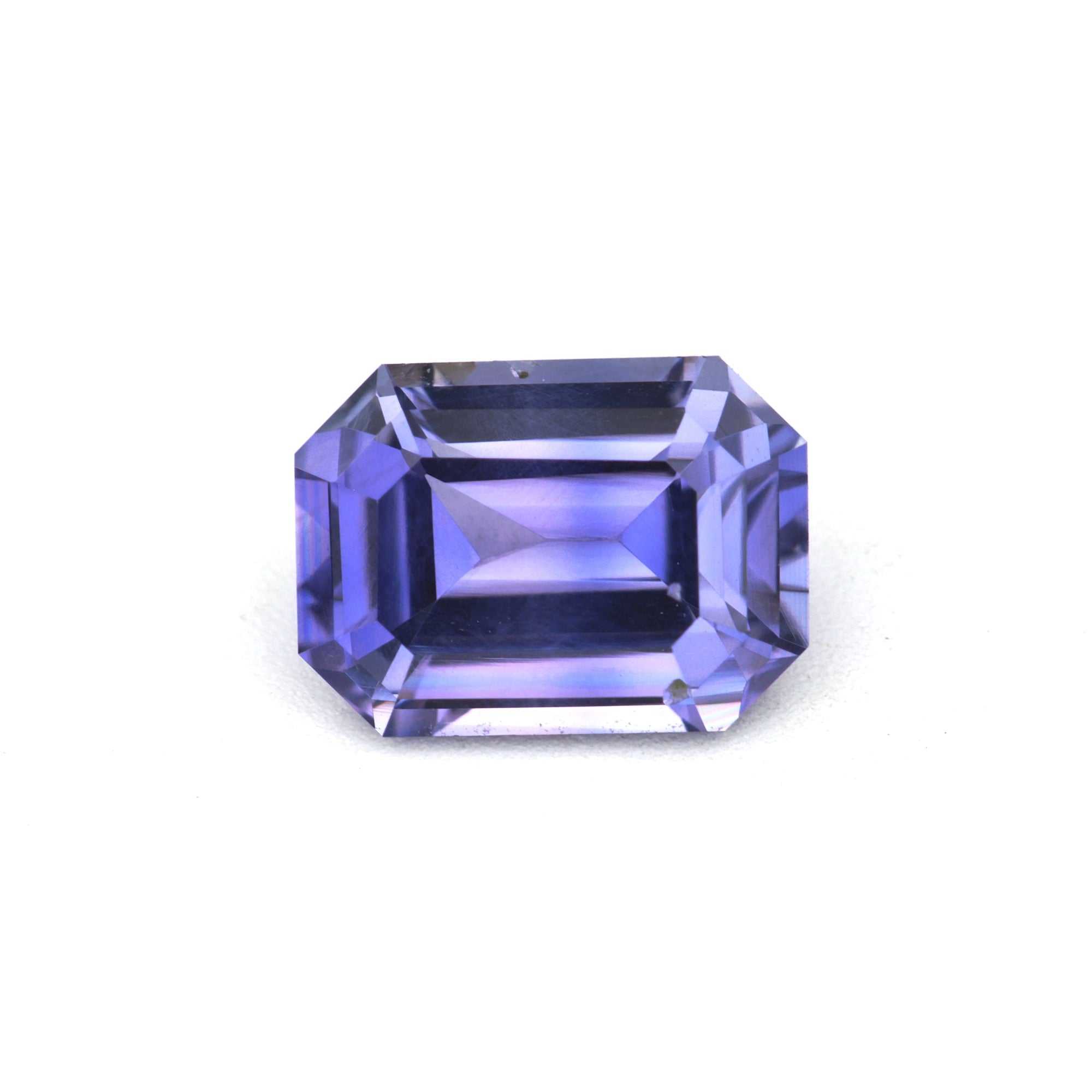 1.10 ct emerald cut natural violet sapphire from Ceylon with soft violet hue and clarity