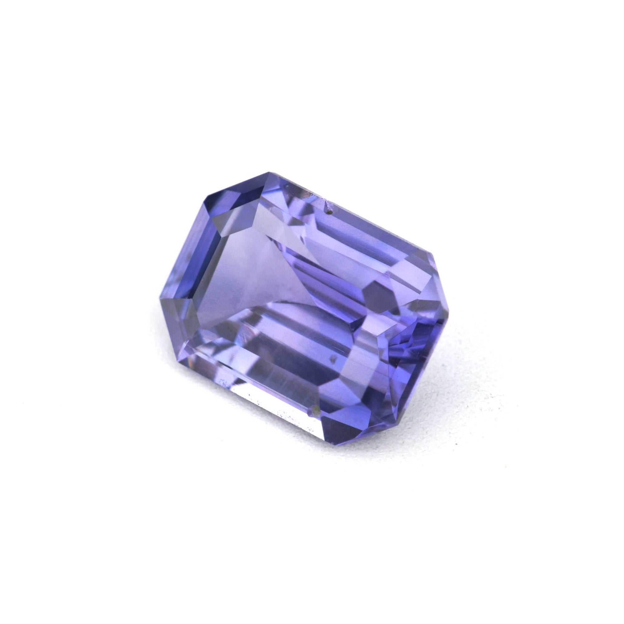 1.10 ct natural violet sapphire emerald cut showing clarity and brilliance