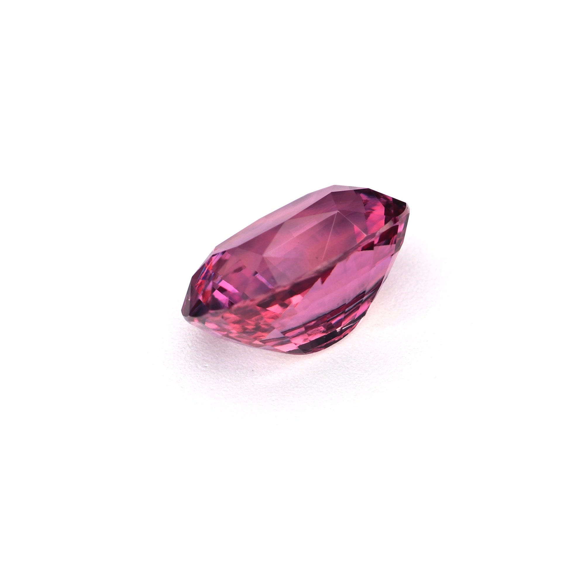 1.13 ct Vietnam purplish pink sapphire on display showing color from multiple angles