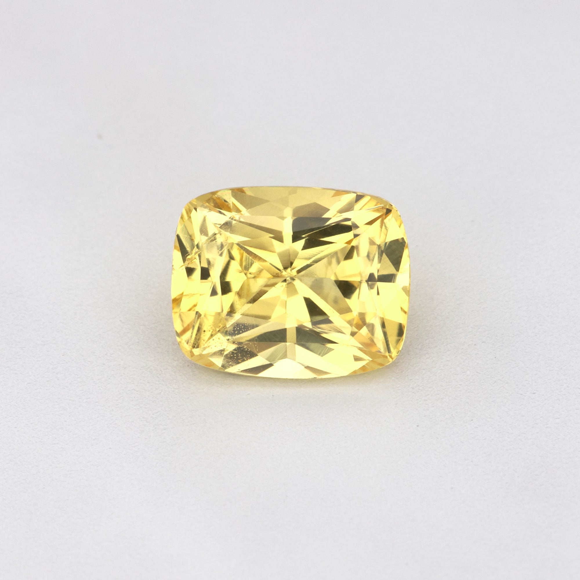 1.19 ct Cushion Cut Ceylon Yellow Sapphire showcasing its stunning golden hue and natural brilliance.