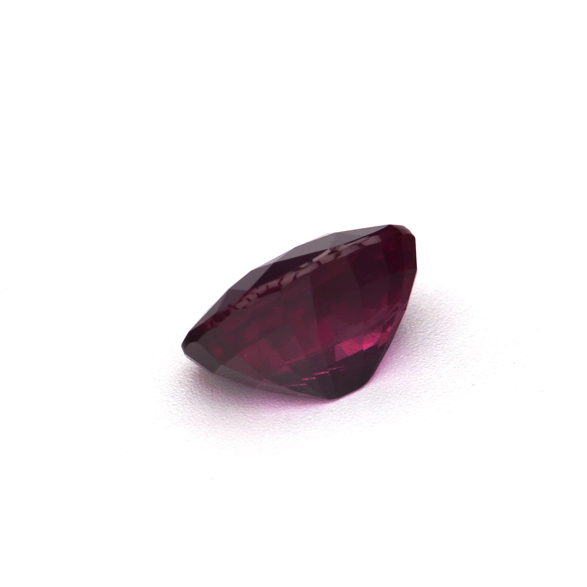 1.65 ct Oval Ruby, unheated, rich red hue, showcasing its brilliance and clarity in a polished cut.
