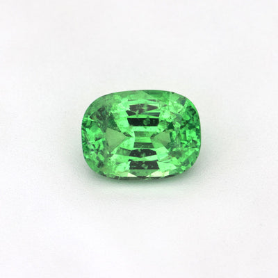1.06 ct Cushion Tsavorite Garnet showcasing brilliant green color, untreated and GIA certified.