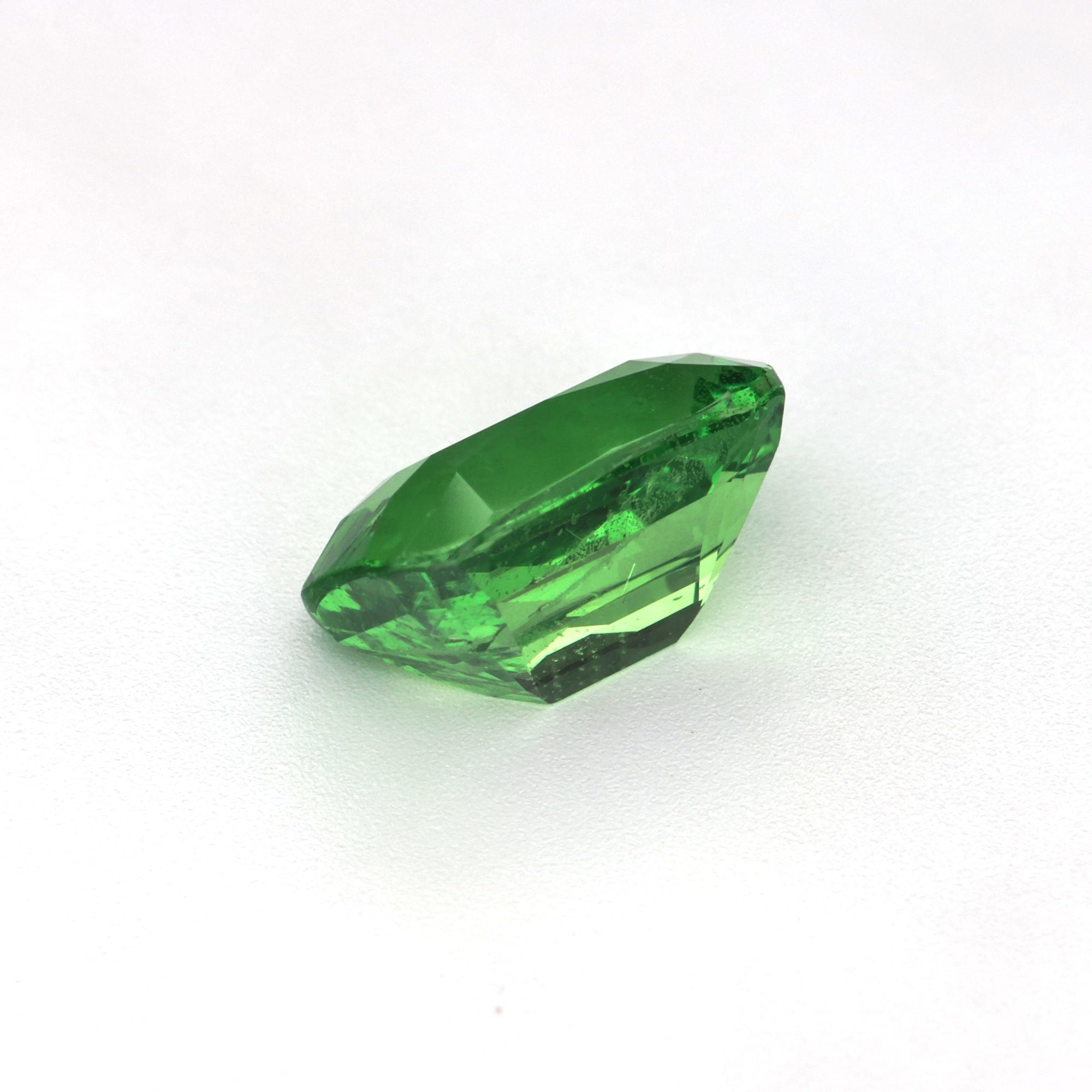1.86 ct Cushion Tsavorite Garnet in natural yellowish-green hue, untreated, with brilliant clarity and shine.