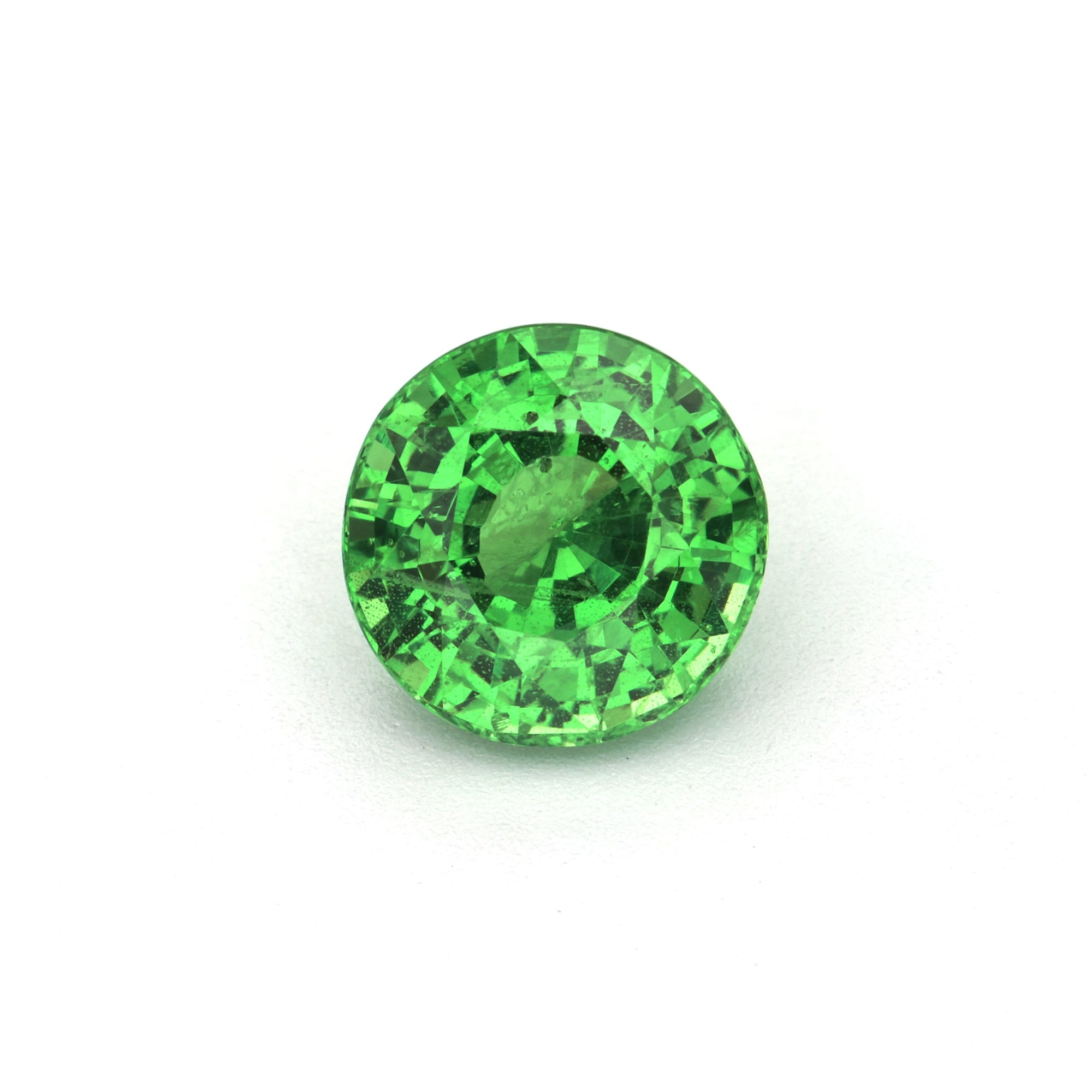 1.79 ct Round Tsavorite Garnet, clarity enhanced, GIA certified, showcasing vivid yellowish-green brilliance.