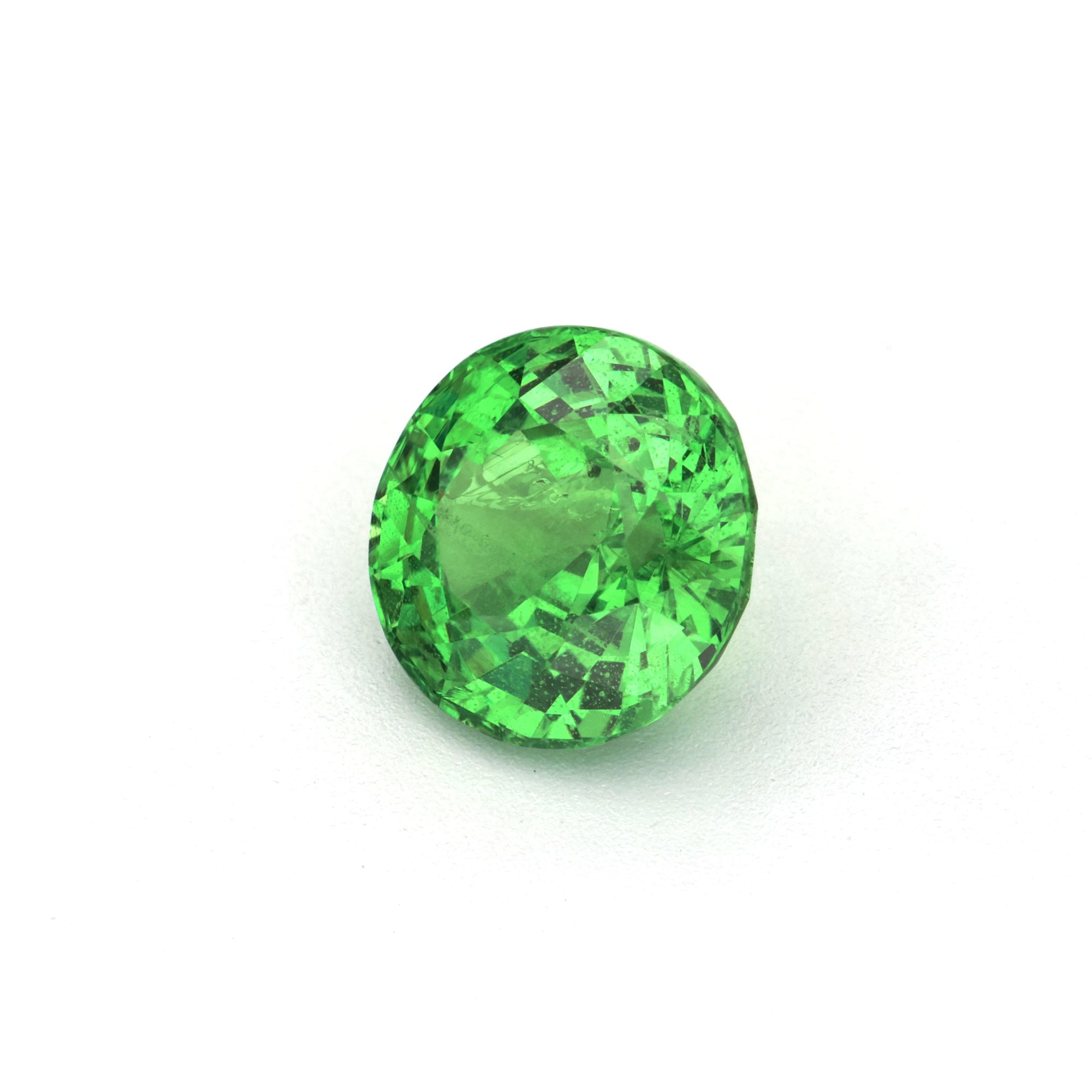 1.79 ct Round Tsavorite Garnet, vibrant yellowish-green gemstone, clarity enhanced with GIA report, round brilliant cut.