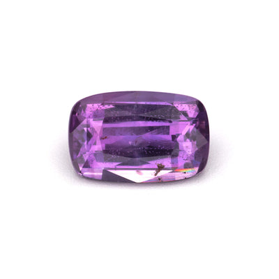 1.45 ct Natural Heat-Treated Purple Sapphire showcasing a rich, velvety pinkish-purple hue.