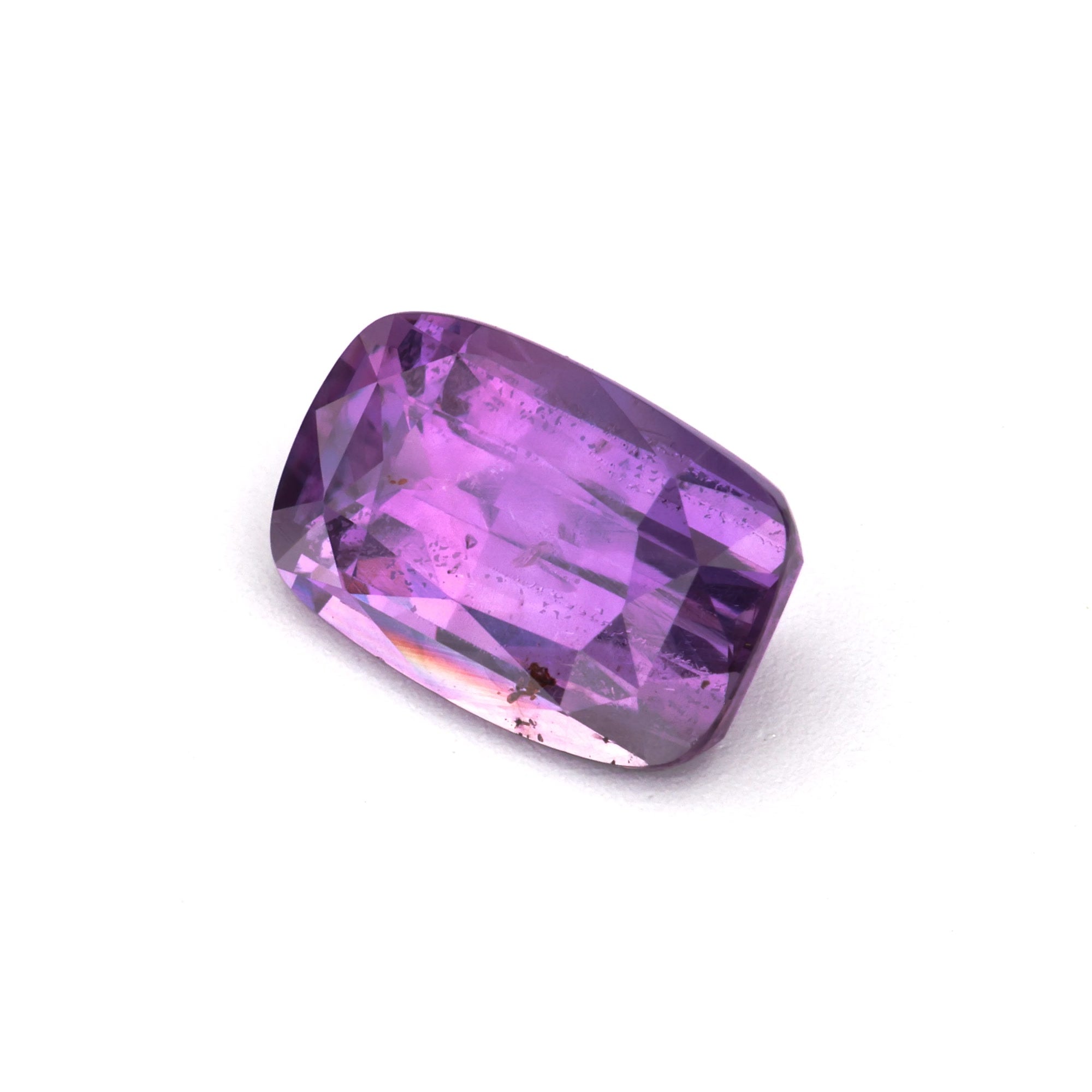 1.45 ct Natural Heat-Treated Purple Sapphire shows a rich, velvety hue and Slightly Included clarity.