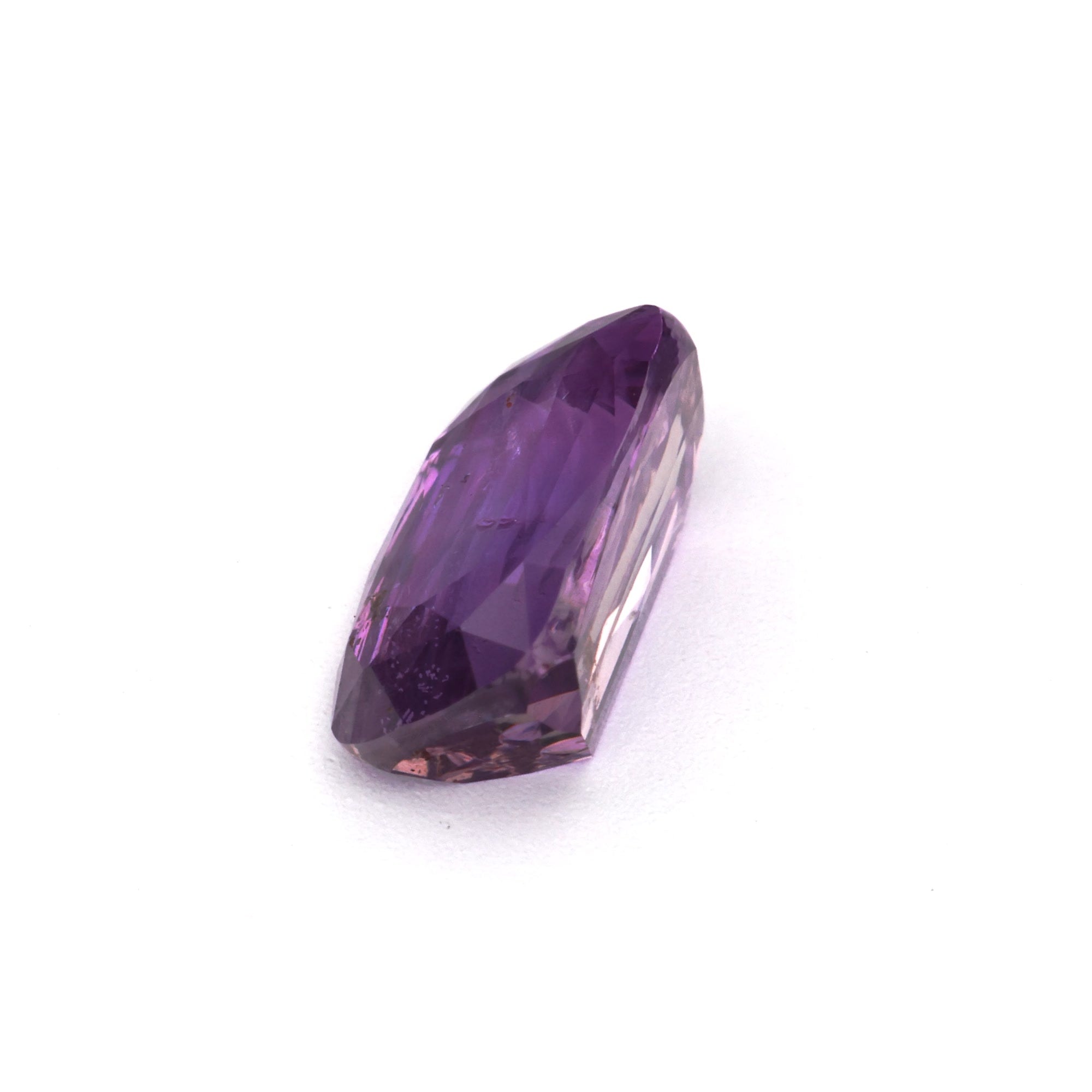 1.45 ct Natural Heat-Treated Purple Sapphire showcasing its rich hue and cushion cut.
