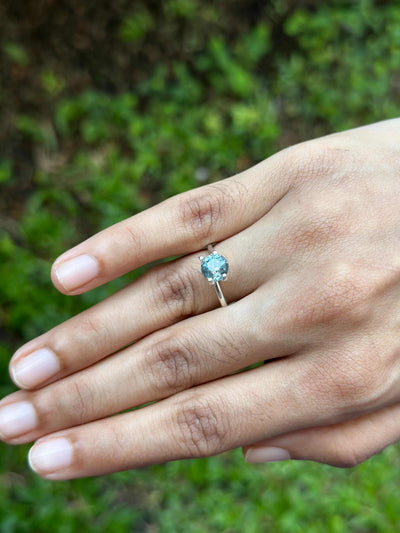 2.08 ct teal sapphire round mixed brilliant cut unheated gemstone with exceptional clarity and dynamic light reflection