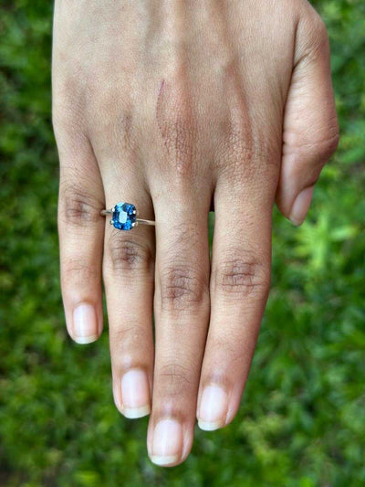 Deep blue unheated sapphire gemstone with brilliant clarity and rich color