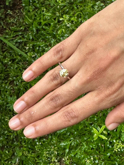 2.10 ct unheated yellow sapphire gemstone with natural golden hue and excellent clarity