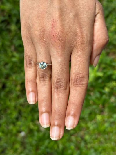 1.70 carat untreated light green sapphire gemstone with brilliant cut and natural clarity