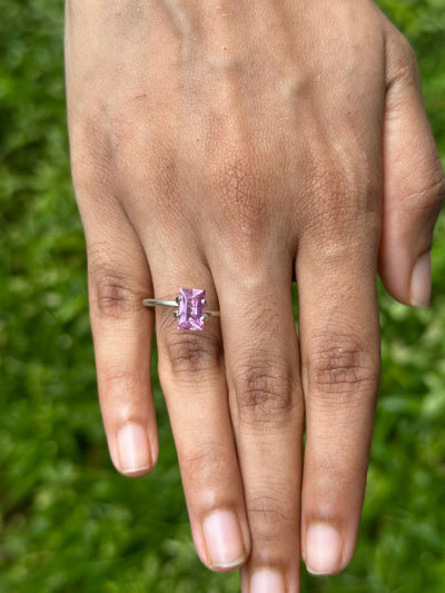 1.45 ct natural unheated Baguette Radiant Pink Sapphire on display showing pink hue