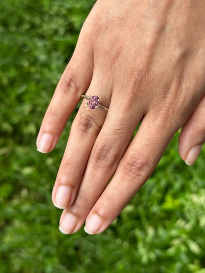 1.13 ct Vietnam purplish pink sapphire stone in hand