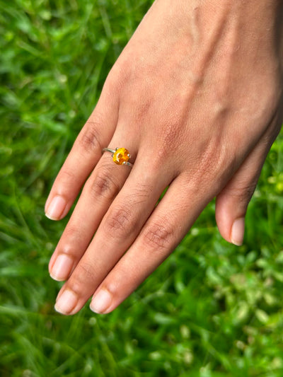 1.63 ct heat-treated Ceylon Orange Sapphire, Oval Cut, GIA certified, close-up view