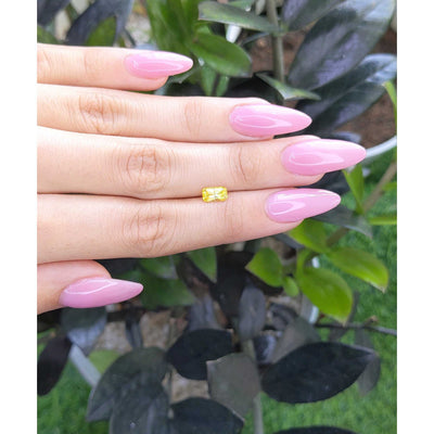 1.00 ct yellow sapphire gemstone with radiant cut and vibrant yellow color