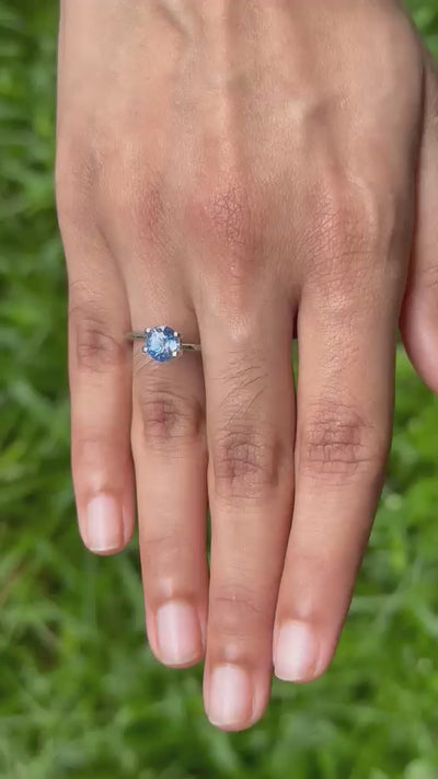 1.75 ct heated blue Ceylon sapphire, round cut, close-up video showing color and brilliance